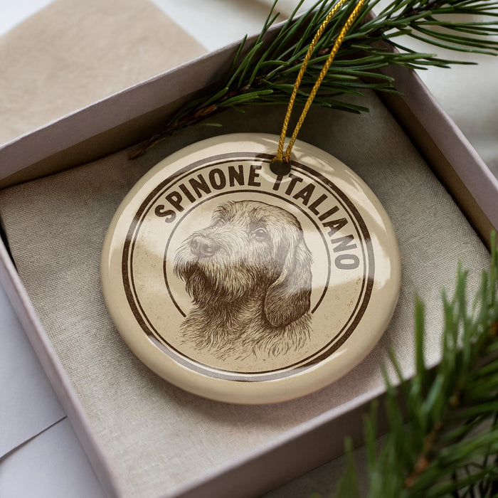 A decorative ornament featuring a Spaniel dog's head, with the text "Spinone Italiano" around the image.