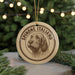 A circular ornament featuring a Spaniel dog's head, with the text "Spinone Italiano" around the edge.