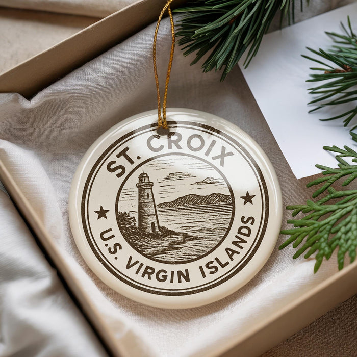A circular ornament with the text "ST. CROIX US VIRGIN ISLANDS" printed on it, hanging from a string.
