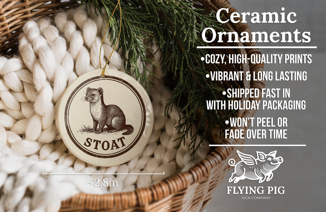 Ceramic ornaments, specifically Stoat ornaments, are displayed in a wicker basket. The text highlights the ornaments as "cozy, high-quality prints" and "vibrant and long lasting", with a description of their shipping speed and packaging. The image also includes a logo for "Flying Pig - SIGN COMPANY".
