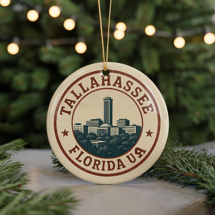 A circular ornament with the text "TALLAHASSE FLORIDAUA" and a graphic of a city skyline.