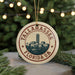 A circular ornament with the text "TALLAHASSE FLORIDAUA" and a graphic of a city skyline.
