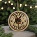 A round ornament featuring a toy fox terrier dog, with the text "TOY FOX TERRIER" printed on it.
