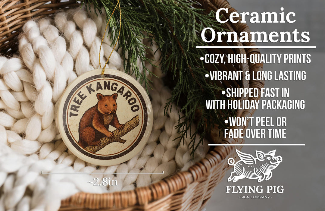 Ceramic ornaments, including a tree kangaroo ornament, are displayed in a woven basket.