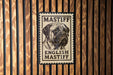 A sign with the text "MASTIFF ENGLISH MASTIFF" is displayed on a wooden wall.