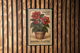 A postage stamp featuring a red flower plant in a pot, with the text "Forever USA" and "Begonia Planter" printed on it.