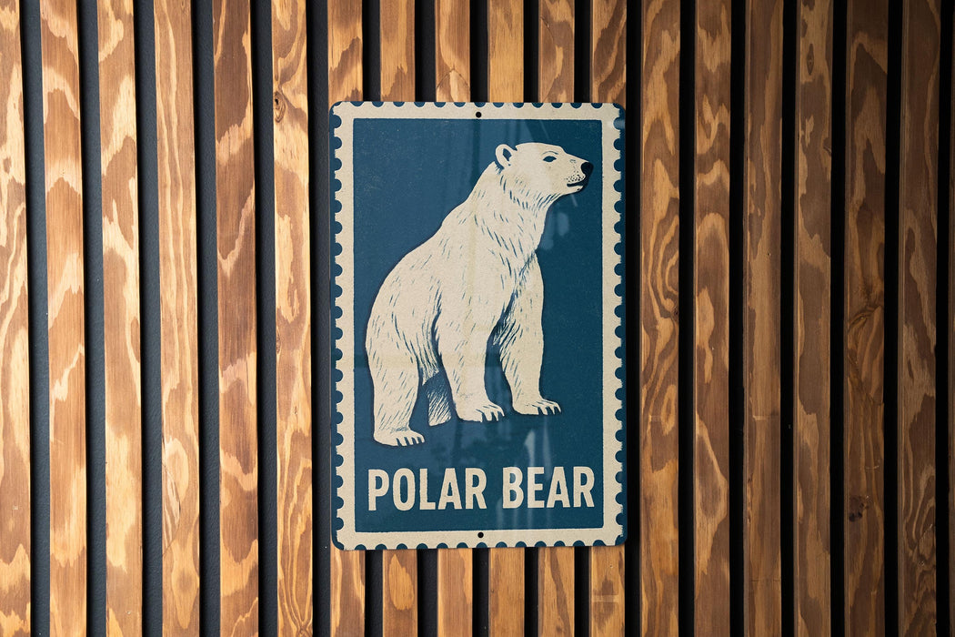A blue and white sign with a white polar bear illustration is mounted on a wooden wall.