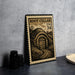 A metal stamp with a detailed illustration of a cave or underground passage, along with the text "ROOT CELLAR USA 34" printed on it.