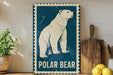 A vintage-style metal sign featuring a polar bear illustration is displayed on a wooden shelf, accompanied by a potted plant, a wooden cutting board, and some lemons.