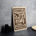 a sign that reads "CANDLE MAKING" with illustrations of candles and a candle holder.