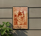 a sign with a picture of a dog, which appears to be a postage stamp or a decorative piece.