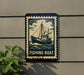 a sign that reads "Fishing Boat" with a depiction of a fishing boat on the sign.