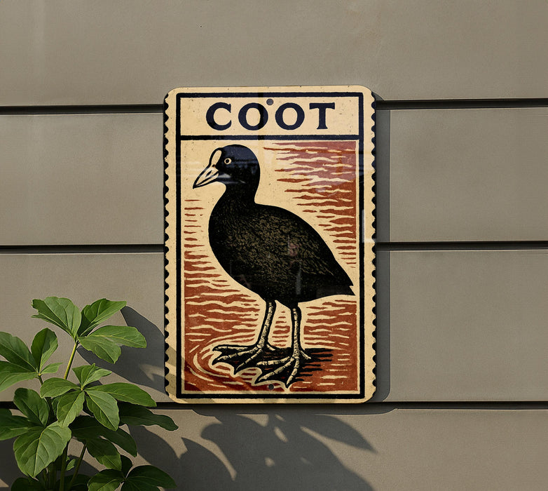 a bird, specifically a black bird with a white beak, standing on a brown and orange striped background.