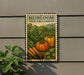 A vintage-style metal sign with illustrations of various vegetables, including carrots, peppers, and leafy greens, mounted on a wall.