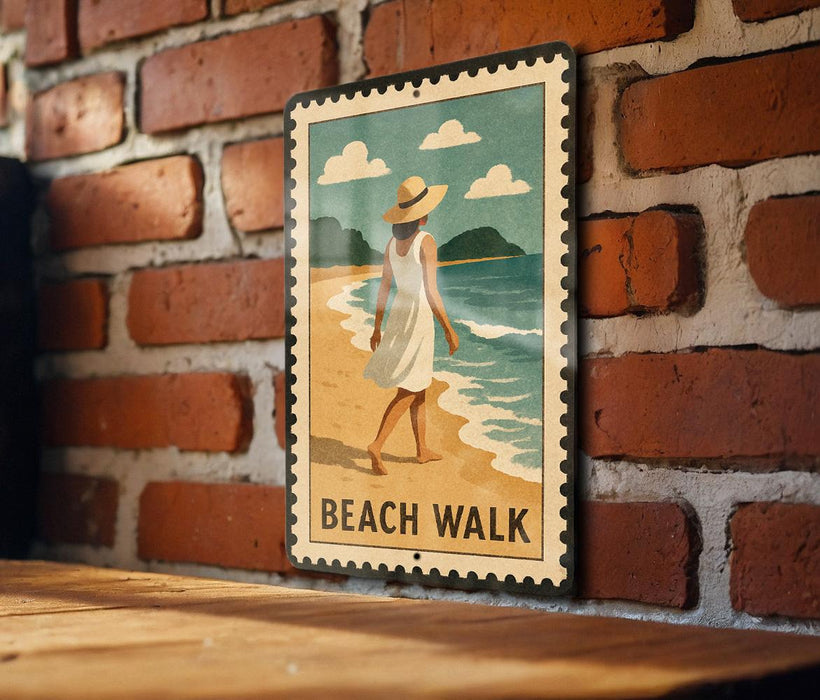A vintage-style metal sign with a woman in a white dress walking on a beach, with the text "BEACH WALK" below the image.