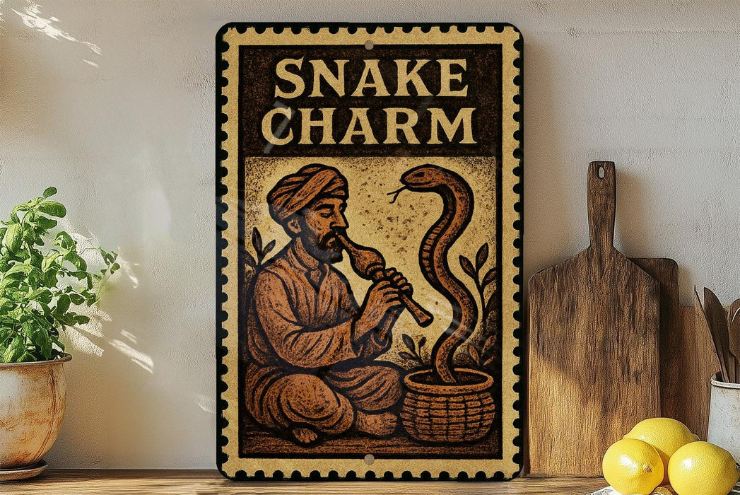 a decorative sign with a man playing a musical instrument next to a large snake.