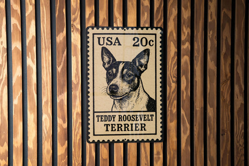 A black and white postage stamp featuring a portrait of Teddy Roosevelt Terrier, with the text "USA 20c" printed on it.