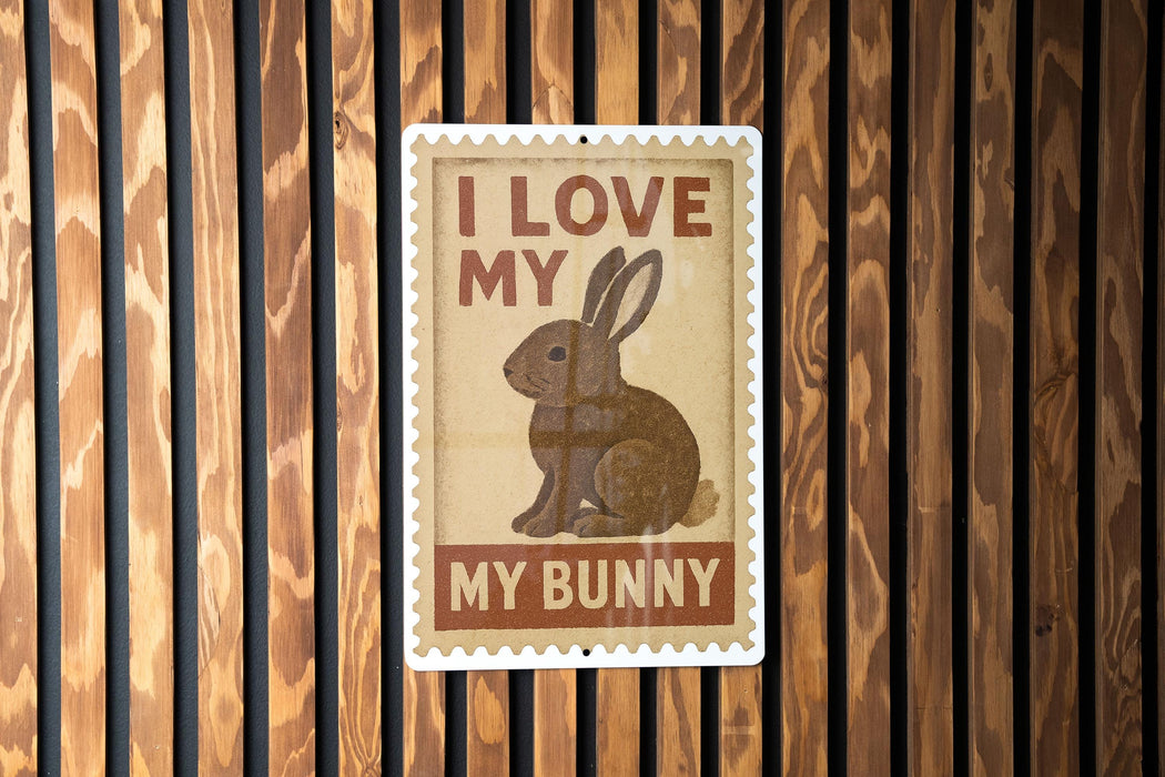 A sign with the text "I LOVE MY BUNNY" and an illustration of a rabbit is displayed on a wooden wall.