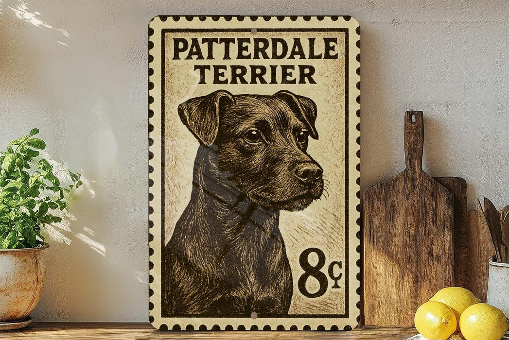 A framed poster of a patterdale terrier dog, with a price of 8 pence, is displayed on a shelf next to a wooden cutting board and some lemons.
