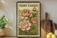 A framed illustration of a peony flower is displayed on a shelf, accompanied by a wooden cutting board and a potted plant.