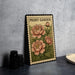 A framed illustration of a peony flower on a wall, with the text "PEONY GARDEN" printed on it.