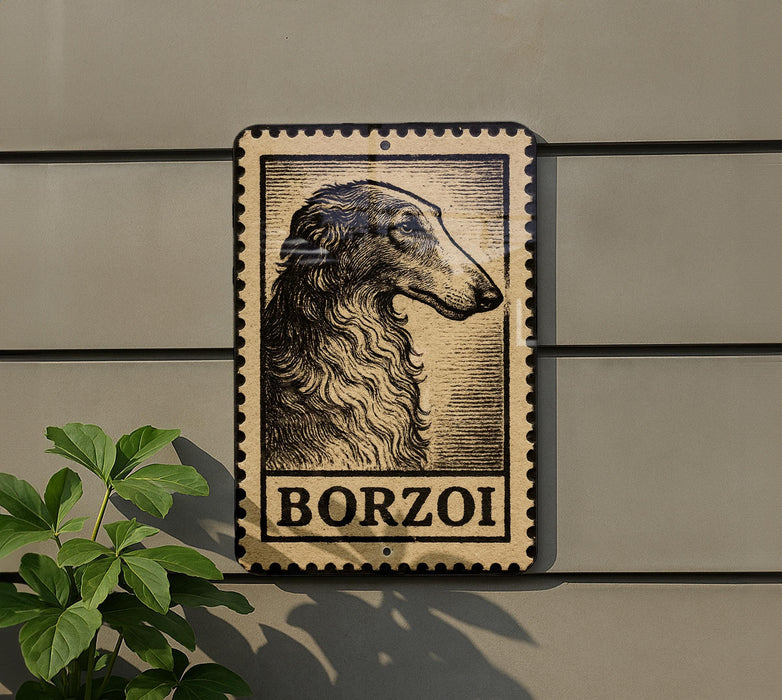 a black and white illustration of a dog's head on a rectangular sign with the word "BORZOI" written below it.
