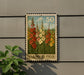 A postage stamp featuring a field of colorful flowers, with the number 50 and the word "GLADIOLUS FIELD" printed on it.
