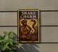 a sign with the word "SNAKE CHARM" and an illustration of a man playing a flute while a snake is in a basket.