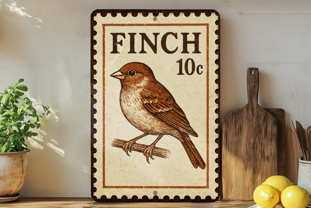 a decorative sign with a bird illustration, placed on a shelf next to a wooden cutting board and some lemons.