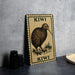 A framed illustration of a kiwi bird is displayed on a table, accompanied by a stack of black camera lenses and a white plate.