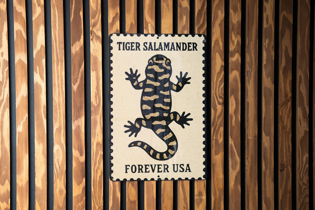 A sign featuring a tiger salamander, with the text "TIGER SALAMANDER FOREVER USA" displayed prominently.
