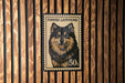 A stamp featuring a close-up of a dog's face, with the text "FINISH LAPPHUND" and "50s" printed on it.