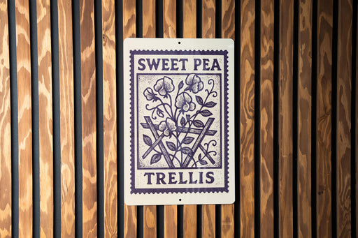 A sign with the text "SWEET PEA TRELLIS" is displayed on a wooden wall.