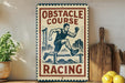a vintage-style sign with the text "OBSTACLE COURSE RACING" and an illustration of a man running. The sign is placed on a wooden surface, with a potted plant, a cutting board, and some lemons nearby.