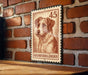 A metal sign featuring a dog's portrait on a brick wall, with the text "Kromföhrländer" below the image.