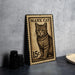 A metal stamp featuring a cat illustration, with the text "MANX CAT" and the price of 15 cents.