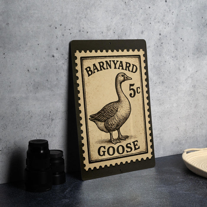 A black and white illustration of a goose on a postage stamp, with the text "Barnyard Goose" and "5c" printed on it.