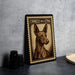 a framed print of a dog, specifically a Cocker Spaniel, with the text "CIRNECO DELETNA" printed on it.