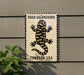 A sign featuring a tiger salamander, with the text "TIGER SALAMANDER FOREVER USA" displayed prominently.