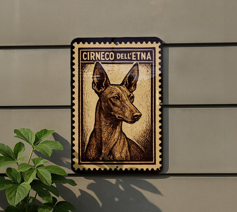 a dog, specifically a brown dog with large ears, depicted on a sign with the text "CIRNECO DELLE ETNA".