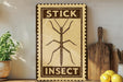 a sign that reads "STICK IN" and "INSECT" with a detailed illustration of a stick insect.
