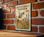A metal sign with a bee and flowers, mounted on a brick wall.