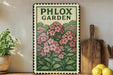 A vintage-style metal sign with a floral illustration, mounted on a wall next to a wooden cutting board and a potted plant.