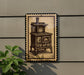 a vintage-style stove with a wood-burning oven, depicted on a wall with a decorative border.