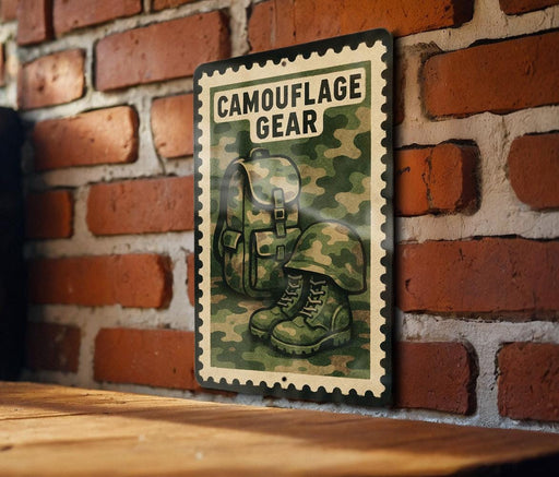 A metal sign with a camouflage pattern and the text "Camouflage Gear" is displayed on a brick wall.