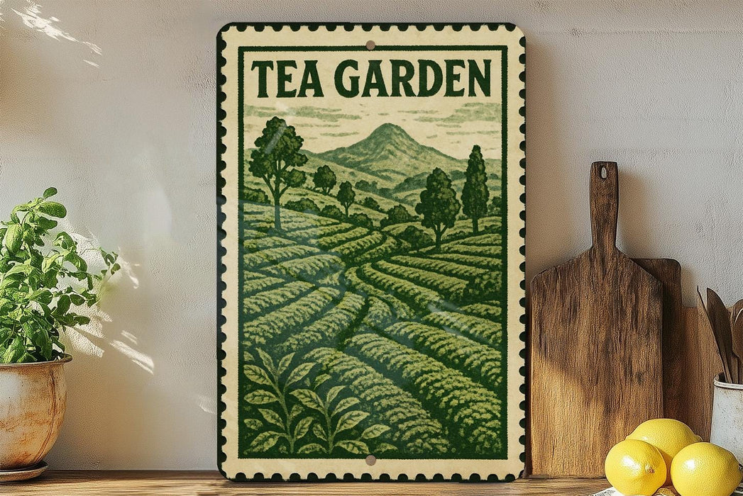 A framed vintage-style poster of a tea garden, featuring a lush green landscape with rolling hills and trees, is displayed on a shelf next to a wooden cutting board and some potted plants.