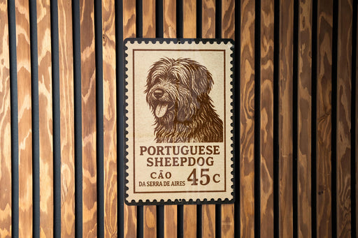 A Portuguese Sheepad dog stamp is displayed on a wooden wall.