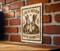 a sign with the text "Life is better with rabbits" and an illustration of two rabbits.