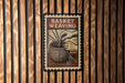 A sign that reads "Basket Weaving" is displayed on a wooden wall.
