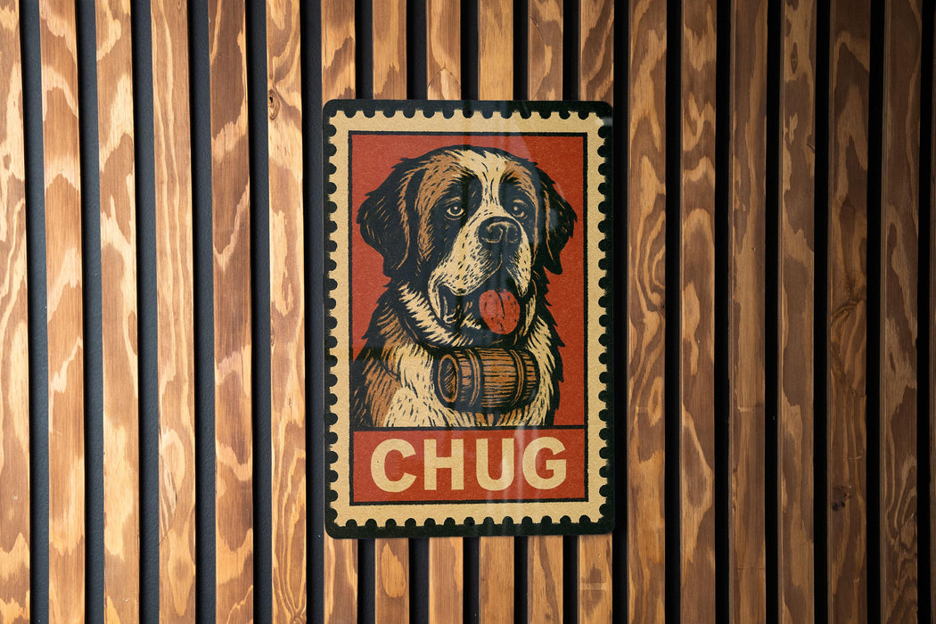 A wooden wall with a framed poster featuring a dog wearing a barrel around its neck, with the word "CHUG" written below the dog.